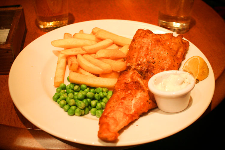 fish and chips and peas. Fish, chips and peas with a